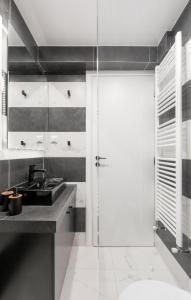 A kitchen or kitchenette at Iosifina Cosy Apartment