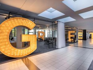 The lobby or reception area at Greet hotel Darmstadt - an Accor hotel -