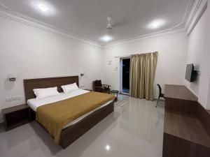 Letto o letti in una camera di Morjim Sunset Hotel