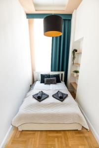 Posteľ alebo postele v izbe v ubytovaní Deluxe Quentin Home next to the Fashion Street