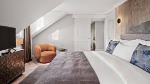 Voodi või voodid majutusasutuse Boutique Hotel Wellenberg toas