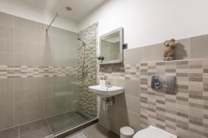 Kúpeľňa v ubytovaní Deluxe Residence By Bella + 23 fotografií