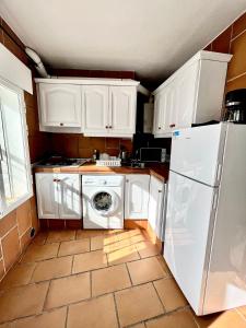 Kuchnia lub aneks kuchenny w obiekcie Apartamento en el casco histórico, a 5 min playa.