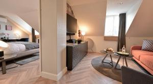 Voodi või voodid majutusasutuse Boutique Hotel Wellenberg toas