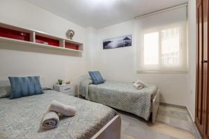 Posteľ alebo postele v izbe v ubytovaní Apartamento Las Terrazas l
