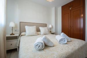Posteľ alebo postele v izbe v ubytovaní Apartamento Las Terrazas l