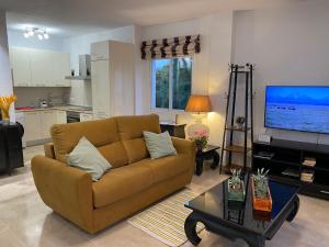 Telewizja i/lub zestaw kina domowego w obiekcie Residencial Algaida