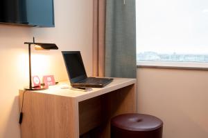 TV a/nebo společenská místnost v ubytování Motel L Lund