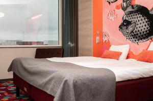 Postel nebo postele na pokoji v ubytování Motel L Lund