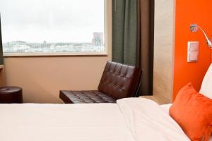 Postel nebo postele na pokoji v ubytování Motel L Lund