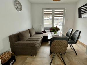 Posedenie v ubytovaní Apartament Cobena