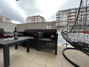 Posedenie v ubytovaní Apartament Cobena