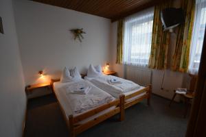 Postel nebo postele na pokoji v ubytování Haus Alpina by Châtel Reizen