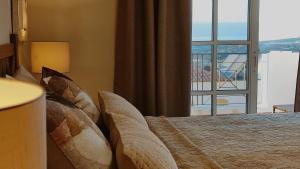 Posteľ alebo postele v izbe v ubytovaní Ocean View 3Bdr Balcon Atlantico
