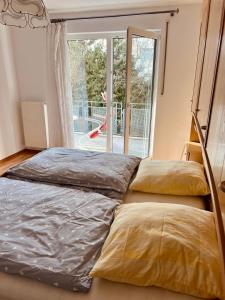 Cama ou camas em um quarto em Komplette Wohnung in Wendelstein bei Nürnberg - Messenähe