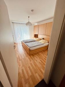 Cama ou camas em um quarto em Komplette Wohnung in Wendelstein bei Nürnberg - Messenähe