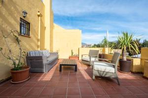 Uma varanda ou terraço em Apartamento Dúplex Los Cartujanos I