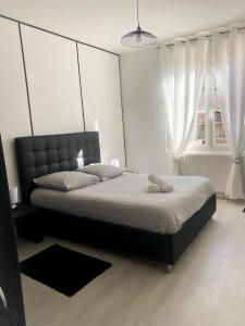 Postel nebo postele na pokoji v ubytování Résidence - le Luxe