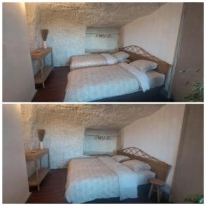 Posteľ alebo postele v izbe v ubytovaní Troglo entre Caves et Châteaux