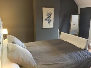 Cama ou camas em um quarto em Countryhouse Zuid-Limburg