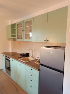 Dapur atau dapur kecil di Apartman LeDa - Ski centar Ravna Planina Gornje Pale +11 gambar