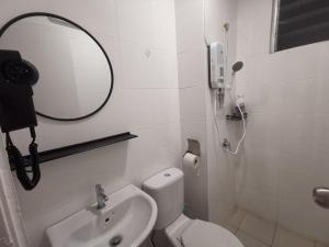Koupelna v ubytování Kuching Metrocity Homestay-S01 Wincy + 10 fotografií