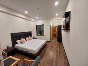 Televisyen dan/atau pusat hiburan di Nomad Bed & Breakfast
