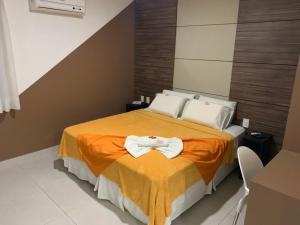 Postel nebo postele na pokoji v ubytování Hotel Encantos de Penedo Alagoas