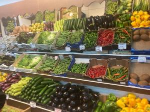 a produce section of a store filled with lots of vegetables at Apartment Duquesa Fairways/Manilva, Spain in Manilva