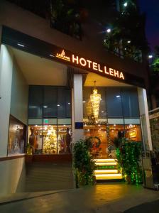 a hotel leela with a sign on the front of it at LEHA Saigon Hotel Airport in Ho Chi Minh City