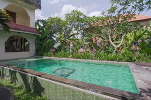 Bazén v ubytování Ubud Kerta City Hotel nebo v jeho okolí