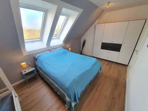 Postel nebo postele na pokoji v ubytování Kiel-Russee Familienwohnung, Lademöglichkeit, Co2 Frei