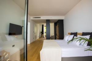 Posteľ alebo postele v izbe v ubytovaní Villa Monachus 2