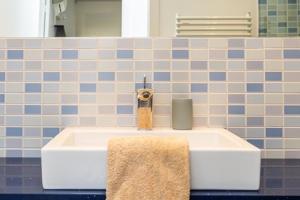 Koupelna v ubytování Idyllic apartment in BCN beach + 18 fotografií