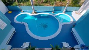 A piscina em ou perto de Delphinus Inn