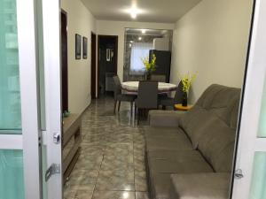 Zona de estar de Apartamento confortável a três quadras do mar