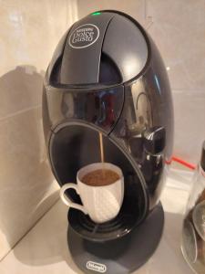 Coffee and tea making facilities at Apartman Đorđević