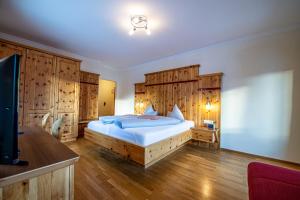Ein Bett oder Betten in einem Zimmer der Unterkunft Hotel Raunig