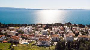 an aerial view of a town next to the water at Apartment Vespa & Jacuzzi in Split
