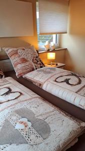 Ліжко або ліжка в номері Ferienwohnung Sternenstube