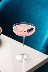 a martini glass with a martini needle in it at Old Course Hotel St Andrews in St. Andrews