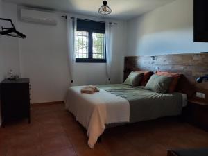A bed or beds in a room at Casa Loko