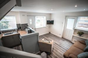 a kitchen with a sink and a counter top at Beach days 1 bed holiday home Prestatyn in Prestatyn