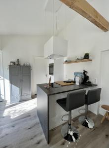 مطبخ أو مطبخ صغير في Tussenrenesseenstrand