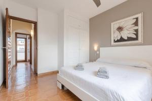 A bed or beds in a room at Casa Ancora by MarCalma