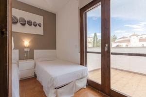 A bed or beds in a room at Casa Ancora by MarCalma