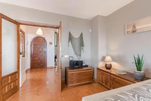 A bed or beds in a room at Casa Ancora by MarCalma