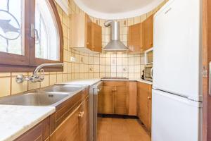 A kitchen or kitchenette at Casa Ancora by MarCalma