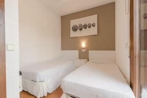 A bed or beds in a room at Casa Ancora by MarCalma