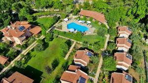 an aerial view of a house with a swimming pool at Dalya Life in Göcek